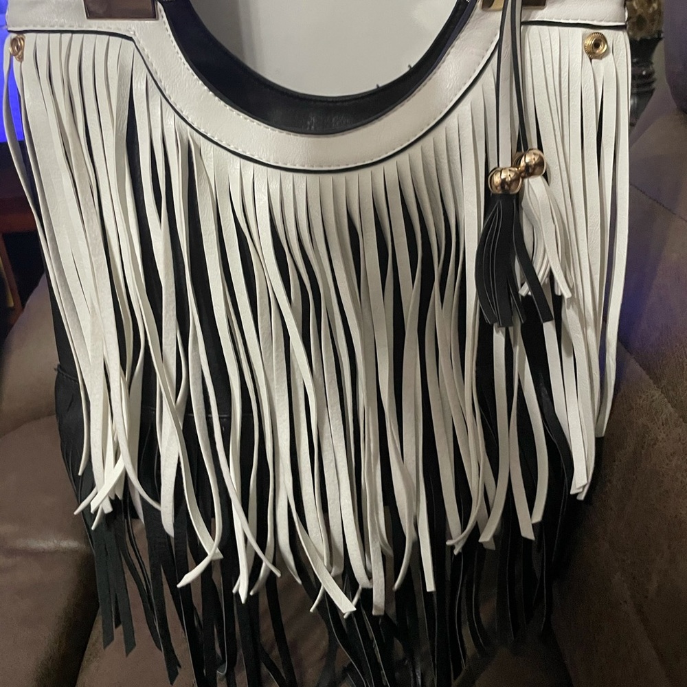 White and black fringe handbag worn only once